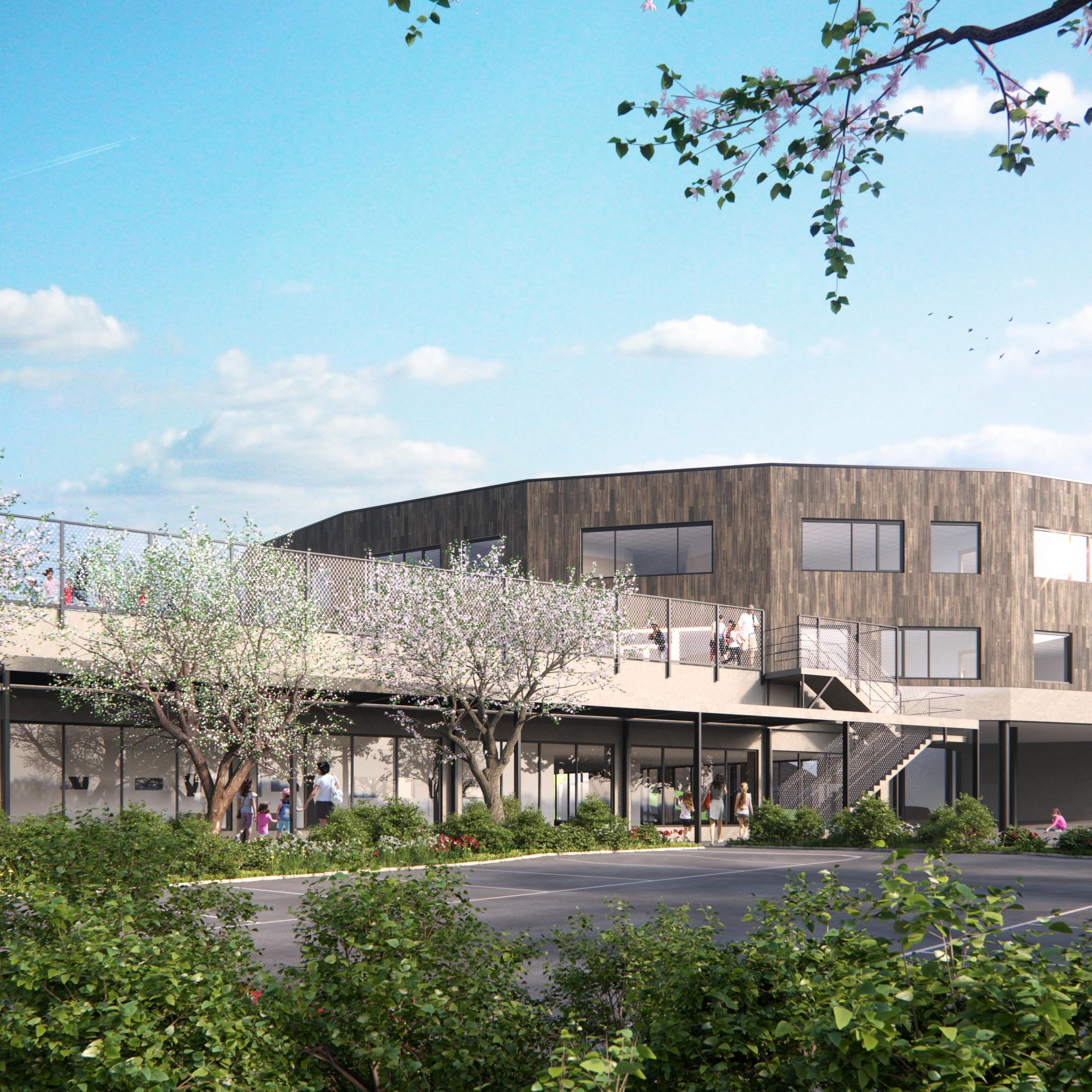 3D-visualisering av skolbyggnad med skolgård i vårmiljö